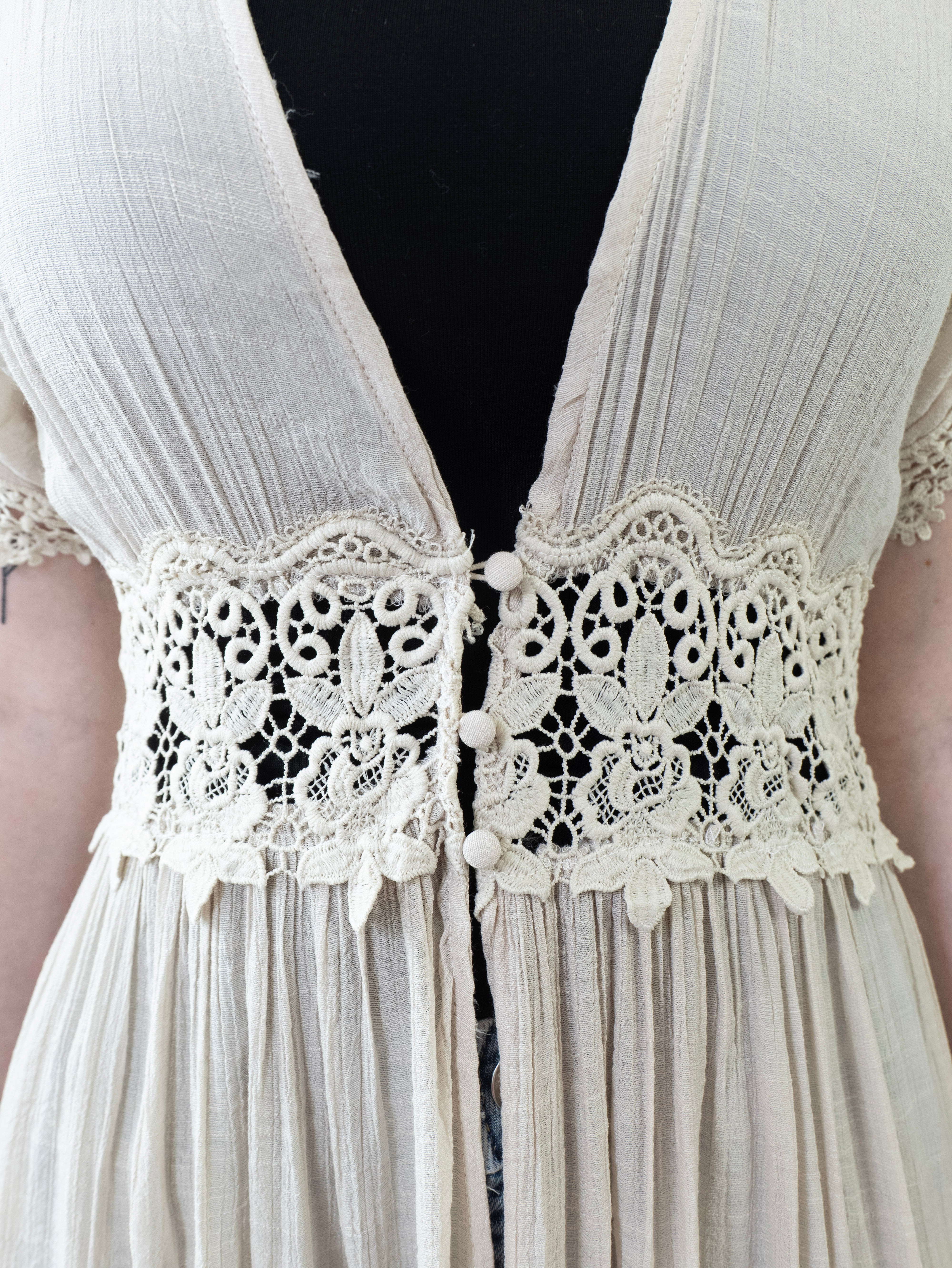 Close-up of lace trim on Breeze Maxi Duster wearing a black tank top