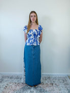Model wearing a denim crochet maxi skirt, full-length front view.